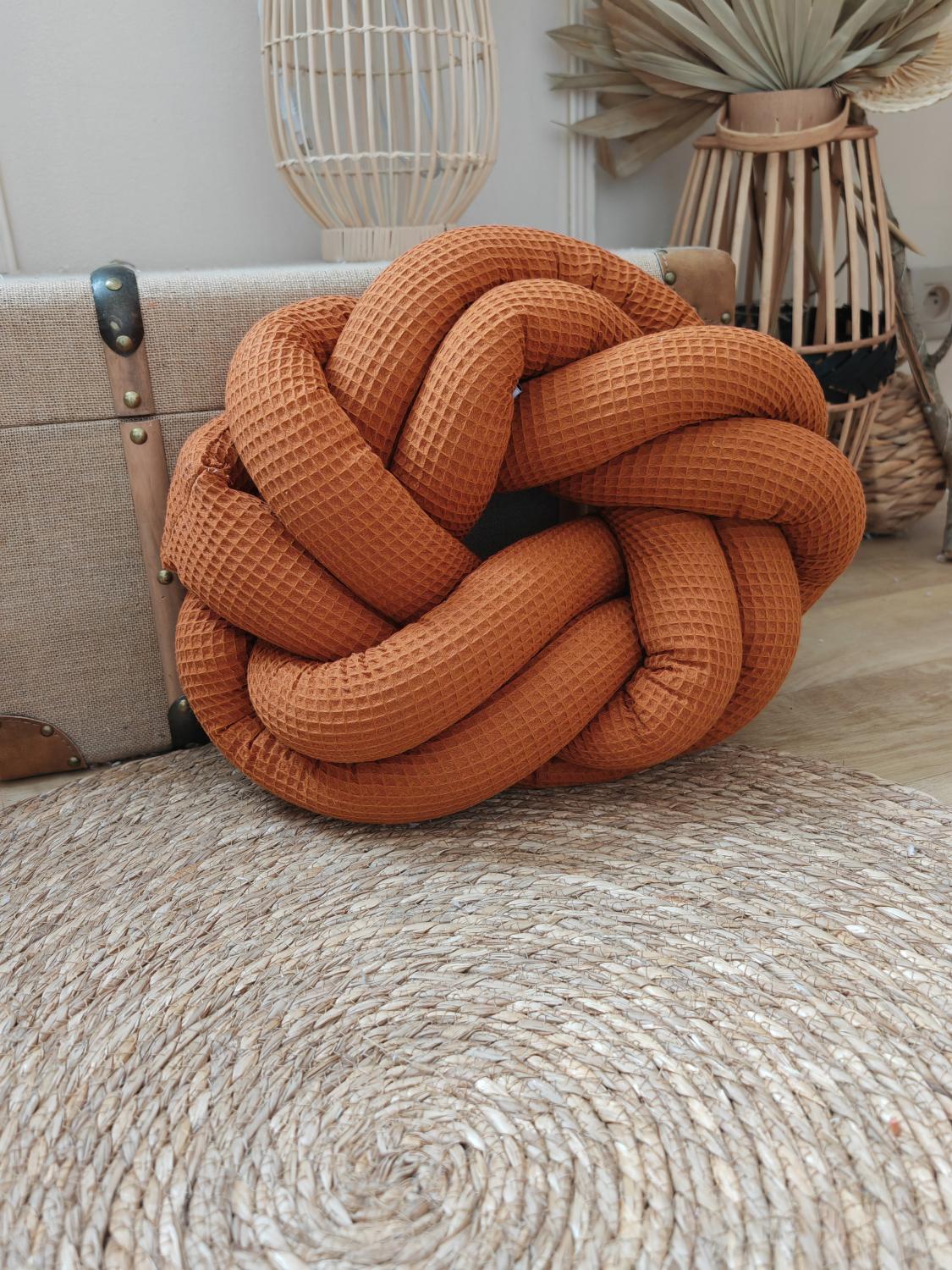 Coussin tressé brique