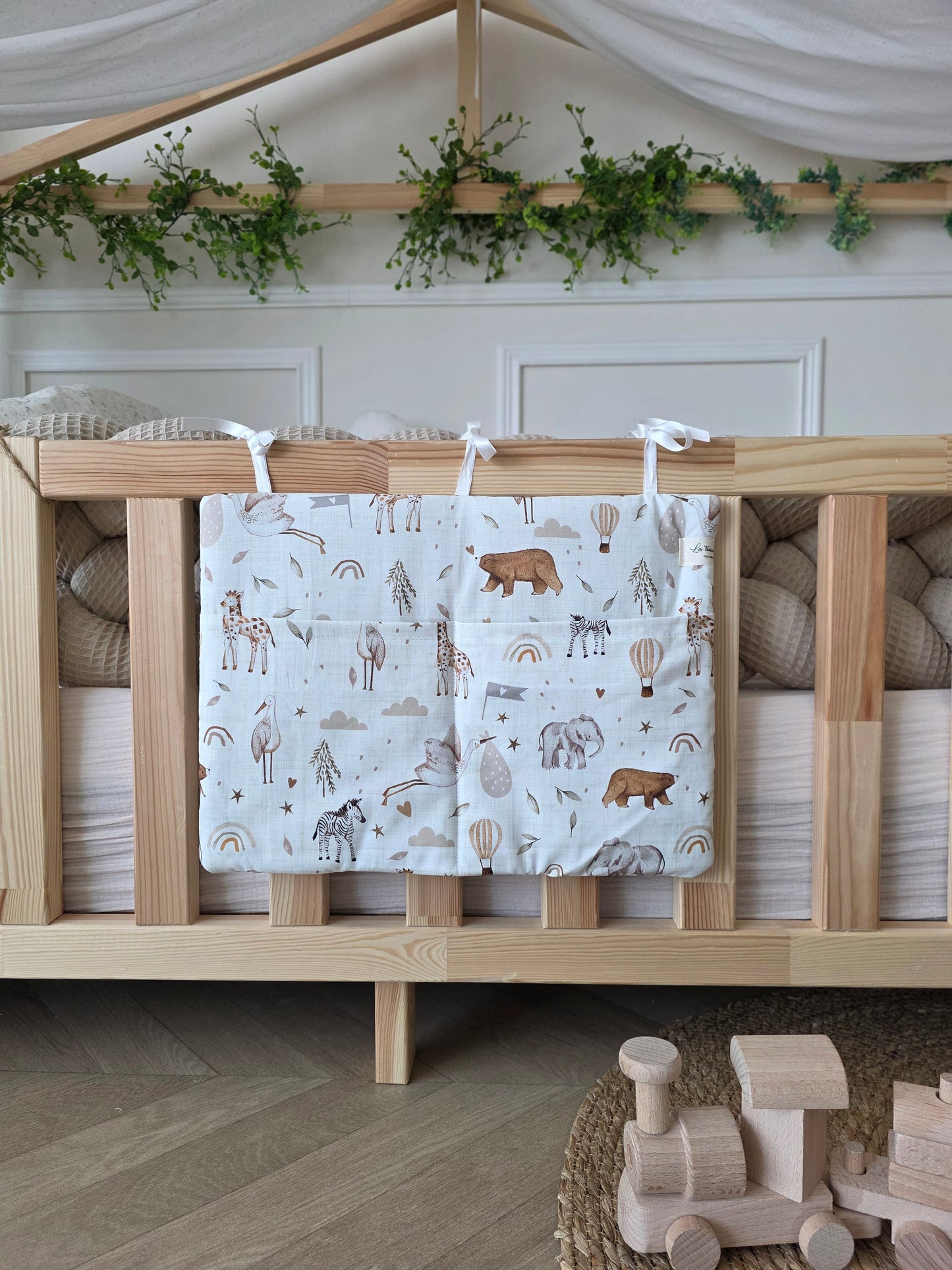 Range doudou cigogne