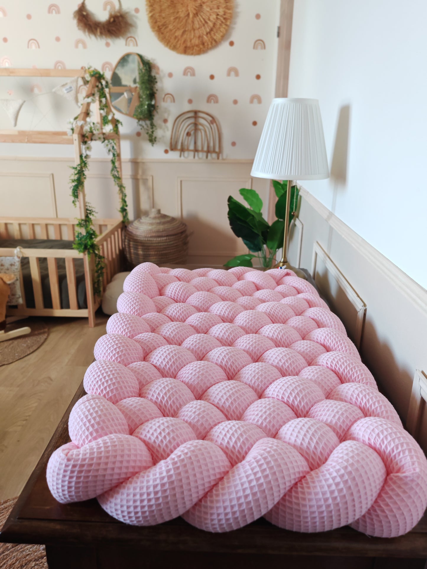 Tapis à langer tressé rose