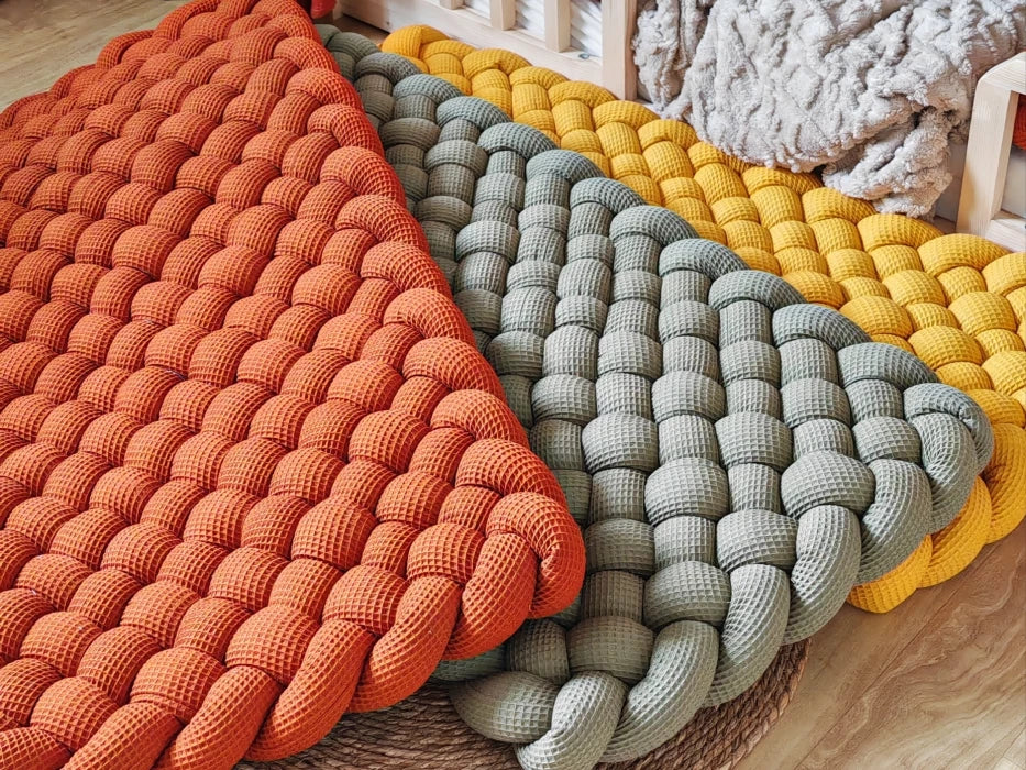 Tapis plat, tressé ou moelleux