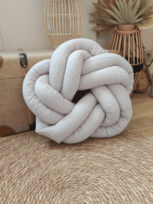 Coussin tressé beige