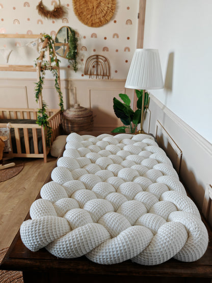 Tapis à langer tressé écru