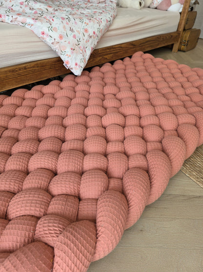 Tapis tressé 140x70cm corail