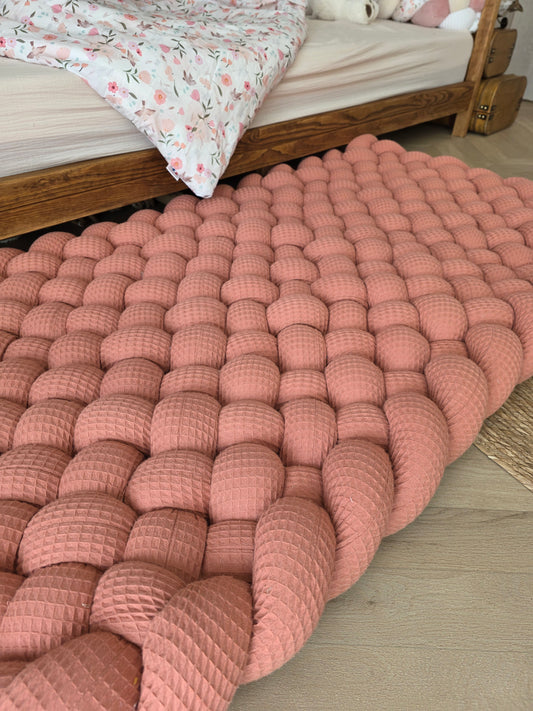 Tapis tressé 140x70cm corail