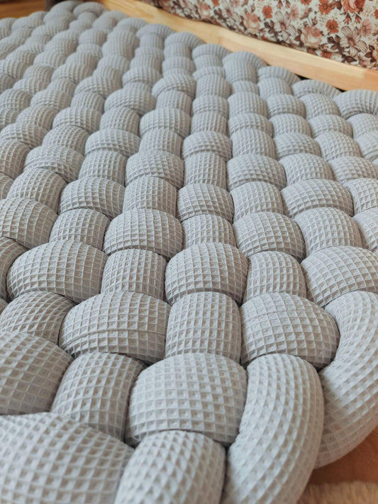 Tapis tressé 140x70cm gris